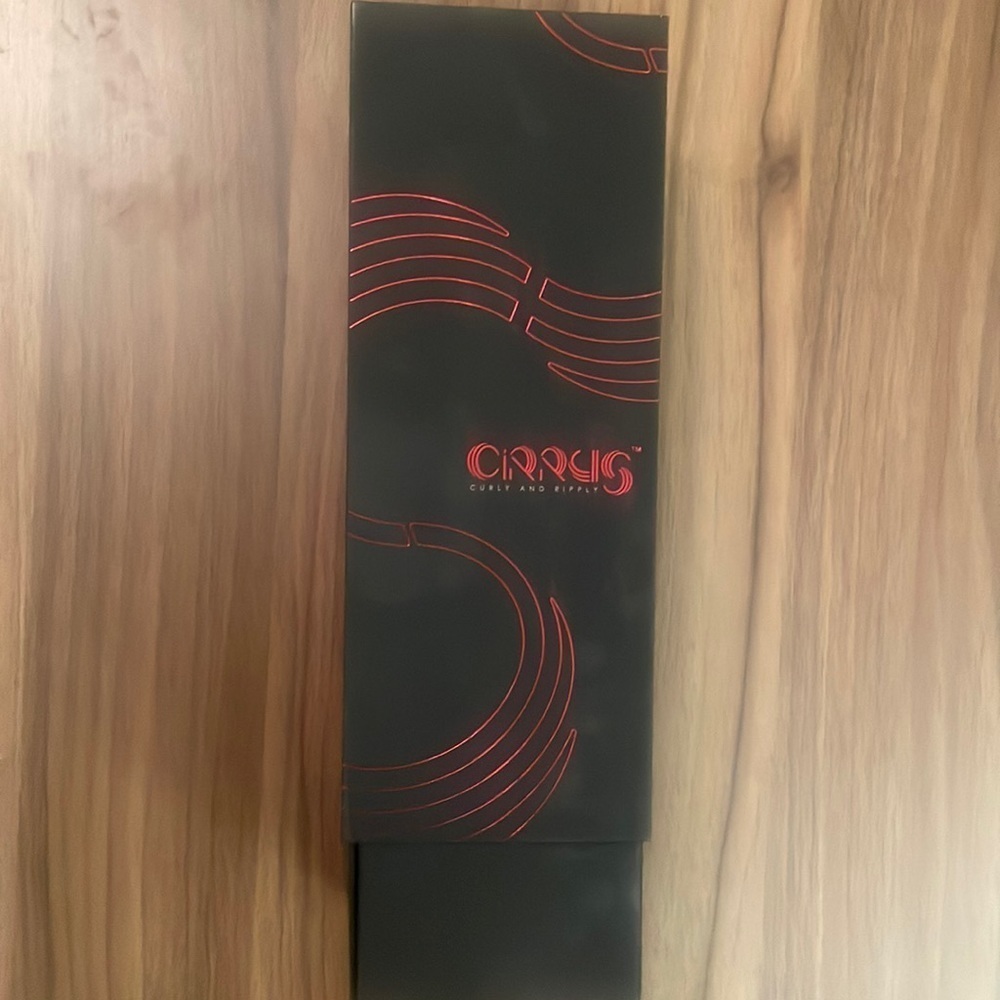 CIRRUS Hair styler with 2 sets of styling wavers.